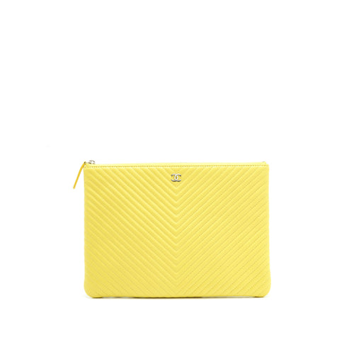 CHANEL CHEVRON CLUTCH BAG IN YELLOW SHW