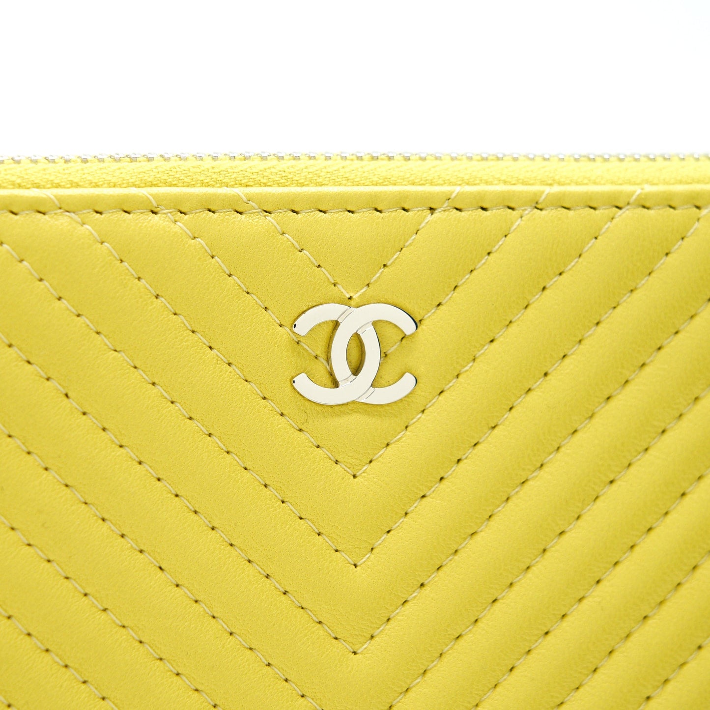 CHANEL CHEVRON CLUTCH BAG IN YELLOW SHW