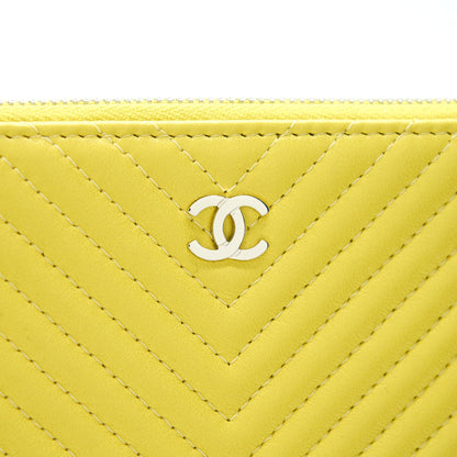 CHANEL CHEVRON CLUTCH BAG IN YELLOW SHW