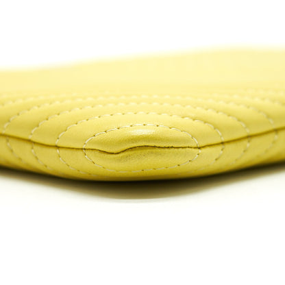 CHANEL CHEVRON CLUTCH BAG IN YELLOW SHW