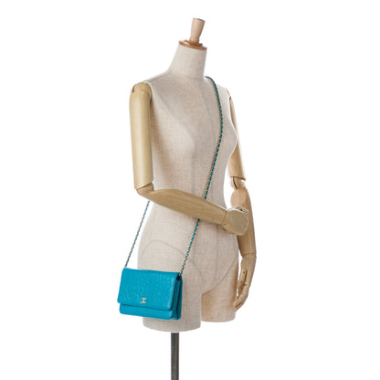 Blue Chanel Lambskin Camellia Embossed Wallet On Chain Crossbody Bag