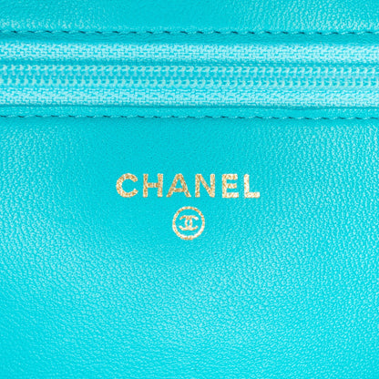 Blue Chanel Lambskin Camellia Embossed Wallet On Chain Crossbody Bag