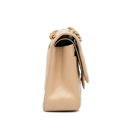 Cream Chanel Jumbo Classic Caviar Double Flap Bag