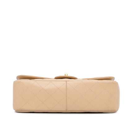 Cream Chanel Jumbo Classic Caviar Double Flap Bag