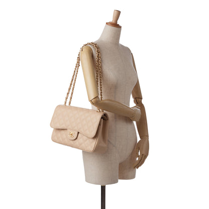 Cream Chanel Jumbo Classic Caviar Double Flap Bag