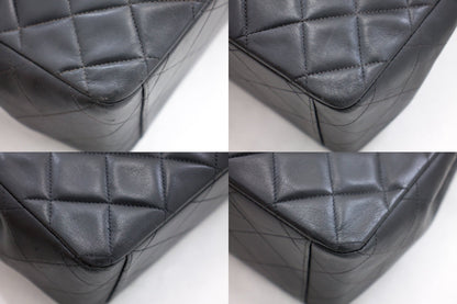 CHANEL Jumbo 13" 2.55 Flap Chain Shoulder Bag Black Lambskin Large g83