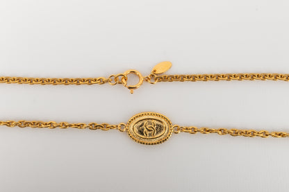 Collier / Sautoir en mtal dor Chanel 1980's