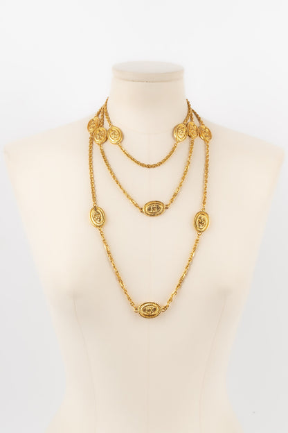 Collier / Sautoir en mtal dor Chanel 1980's