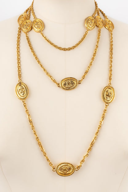 Collier / Sautoir en mtal dor Chanel 1980's