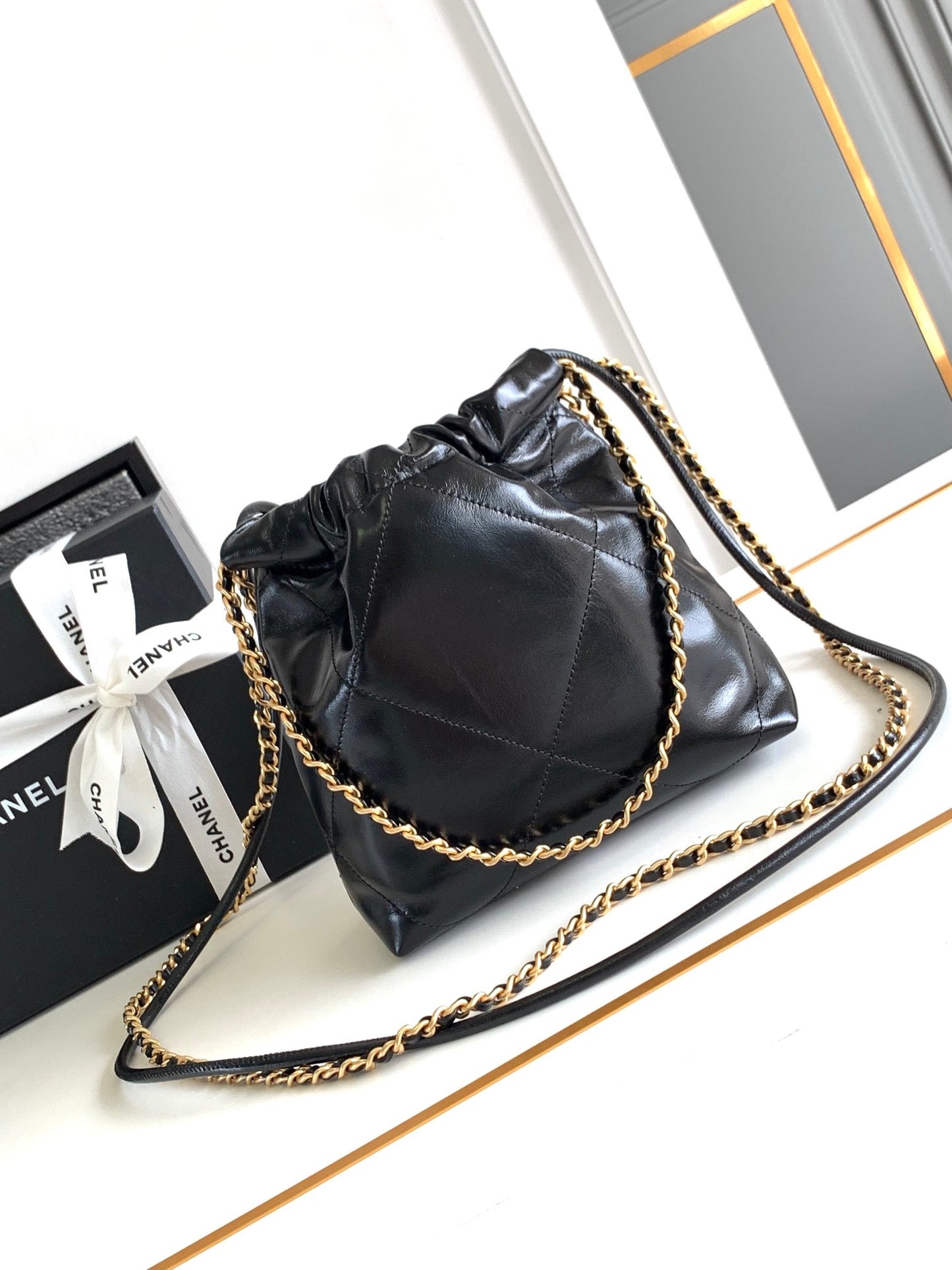 CHANEL 24a 22 hobo bag 20cm black lambskin pearl gold hardware