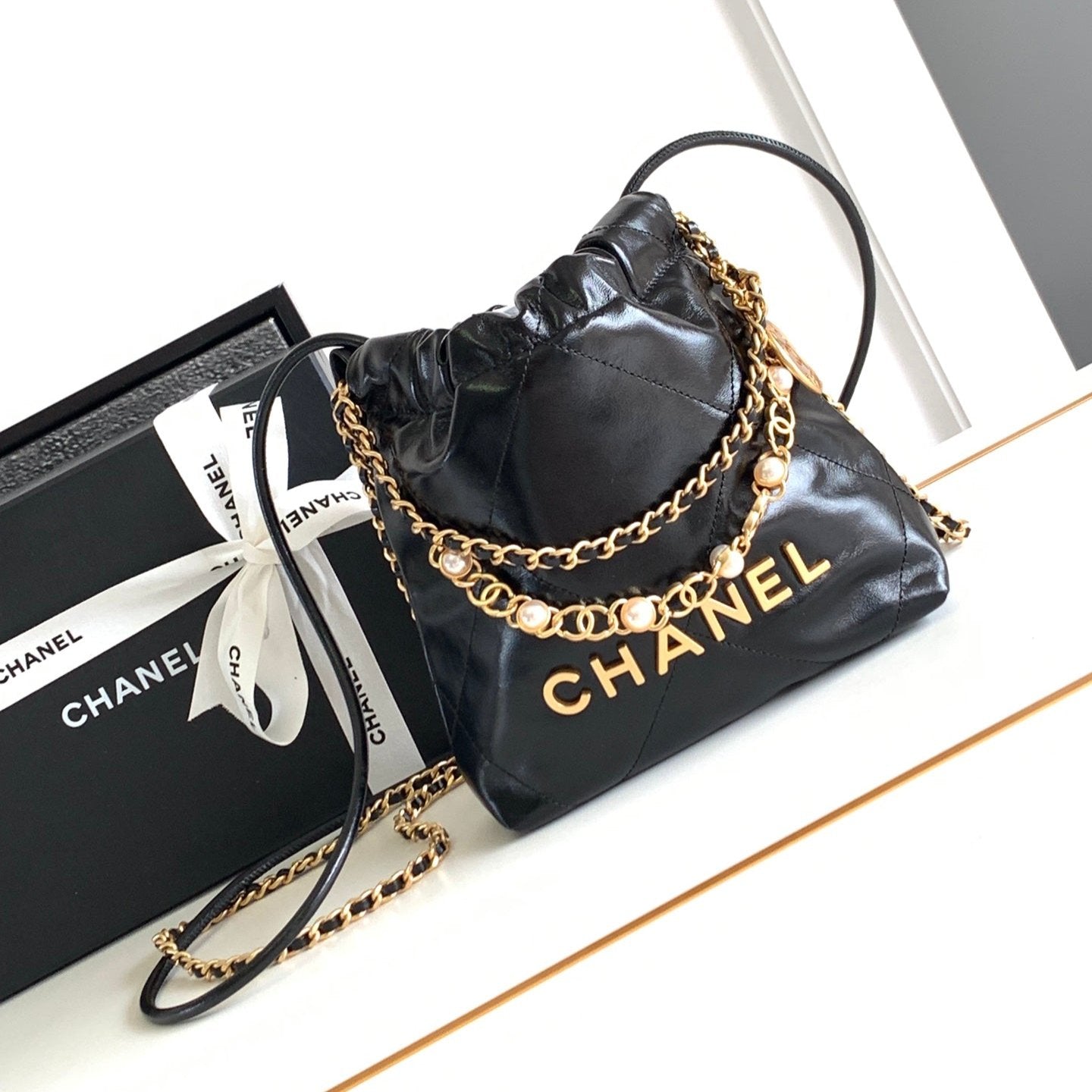 CHANEL 24a 22 hobo bag 20cm black lambskin pearl gold hardware