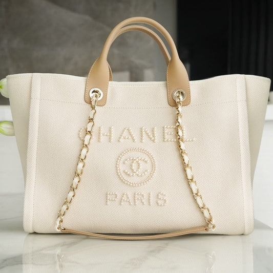 CHANEL LARGE TOTE 39 LIGHT BEIGE CANVAS PEARL LOGO