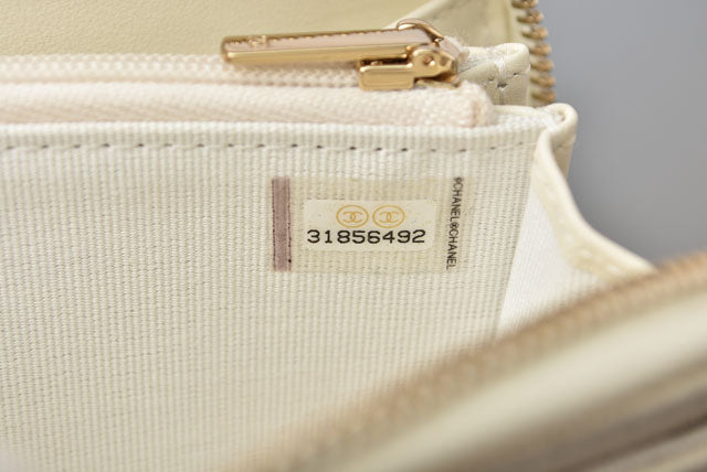 Chanel Caviar Skin Round Zipper Medium Wallet
